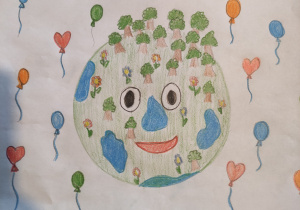 Rysunek przedstawiający uśmiechniętą i szczęśliwą planetę Ziemię.
